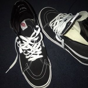 Black and white high-top vans